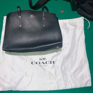 Never used coach bag with carrying case